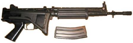 FN FNC Para, with shorter barrel, butt folded and magazine removed.