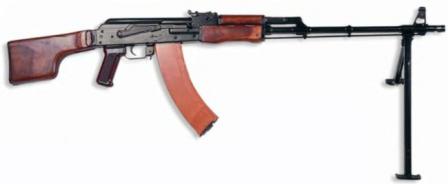 Kalashnikov RPK-74 lightmachine gun, original 1974 model with wooden furniture and red plasctic magazine.